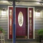 Windowed door with sidelights.