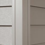 Fiber cement siding corner cap.