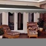 An awning over glass doors.
